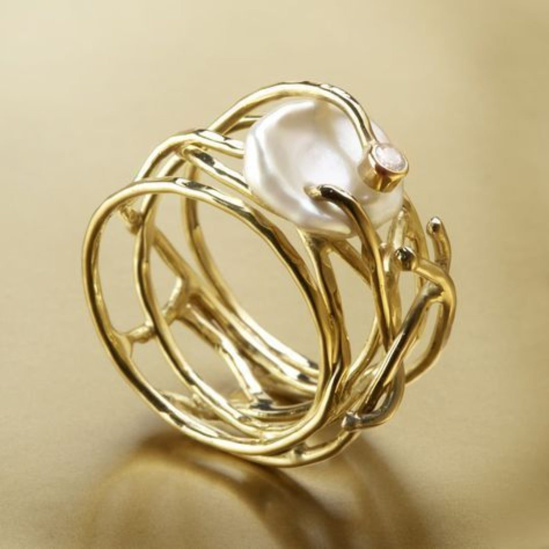 Anillo de Oro Enredado con Perla Natural