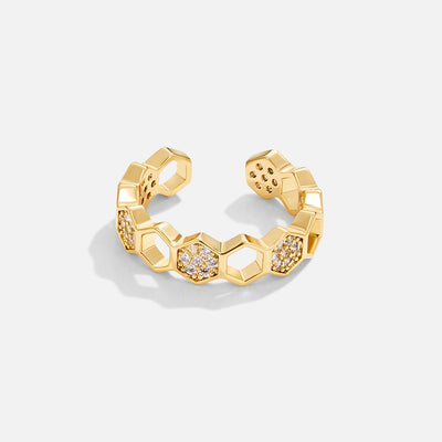 Anillo Dorado con Diseño de Panal y Cristales